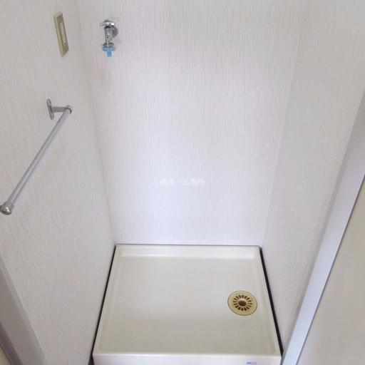 防水パン付洗濯機置場 洗濯機置場には防水パンを設置しました